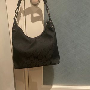 Gucci Authentic Monogram Black GG Canvas with Black leather handle Shoulder Bag